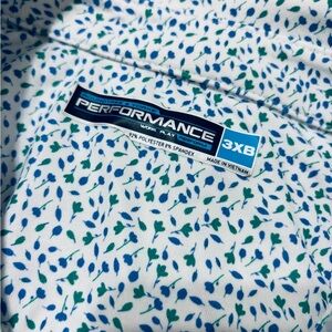 Roundtree & Yorke White Polo with Blue and Green Leaf Design